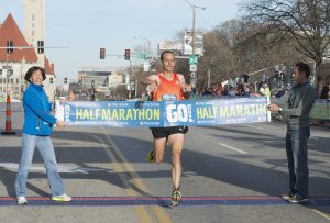 Aaron Braun crosses finish line at the Go! St. Louis marathon