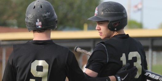 JV teammates pump each other up with a quick pep talk.