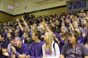 Students show their class spirit at a pep assembly. 