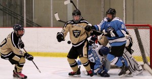 Senior Kyle Kateman looks for the puck in hopes to recover it from the opposing team. (file photo)