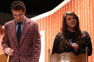 Senior Mike Kuhl and sophomore Marissa Meyers act as Thomas and Beth in "In-Laws, Outlaws, and Other Despicable People," the drama club's fall play. (matt krieg)
