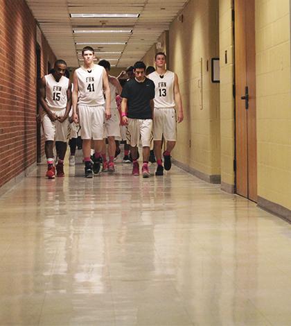 Varsity Boys Basketball Team Fights to Stay Atop the Conference