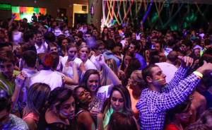 Students dance at the annual Snowcoming dance. The theme was Neon Knights, which was the theme for the past dances (Cameron McCarty)