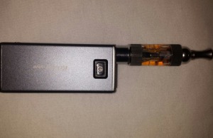 An electronic cigarette charges in it's charger. This e cig cost $60 and is owned by former student Alex Bishop.