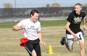 NHS members play flag football for charity in October. NHS members must take part in community service hours as part of the requirements of membership. (file photo)