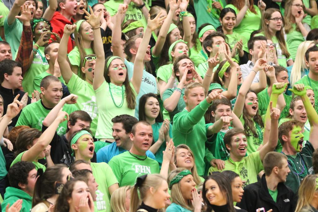 The senior class cheers during the Snowcoming pep assembly last year. The goal of Snowcoming spirit week is to increase excitement for the assembly and the Snowcoming dance. 