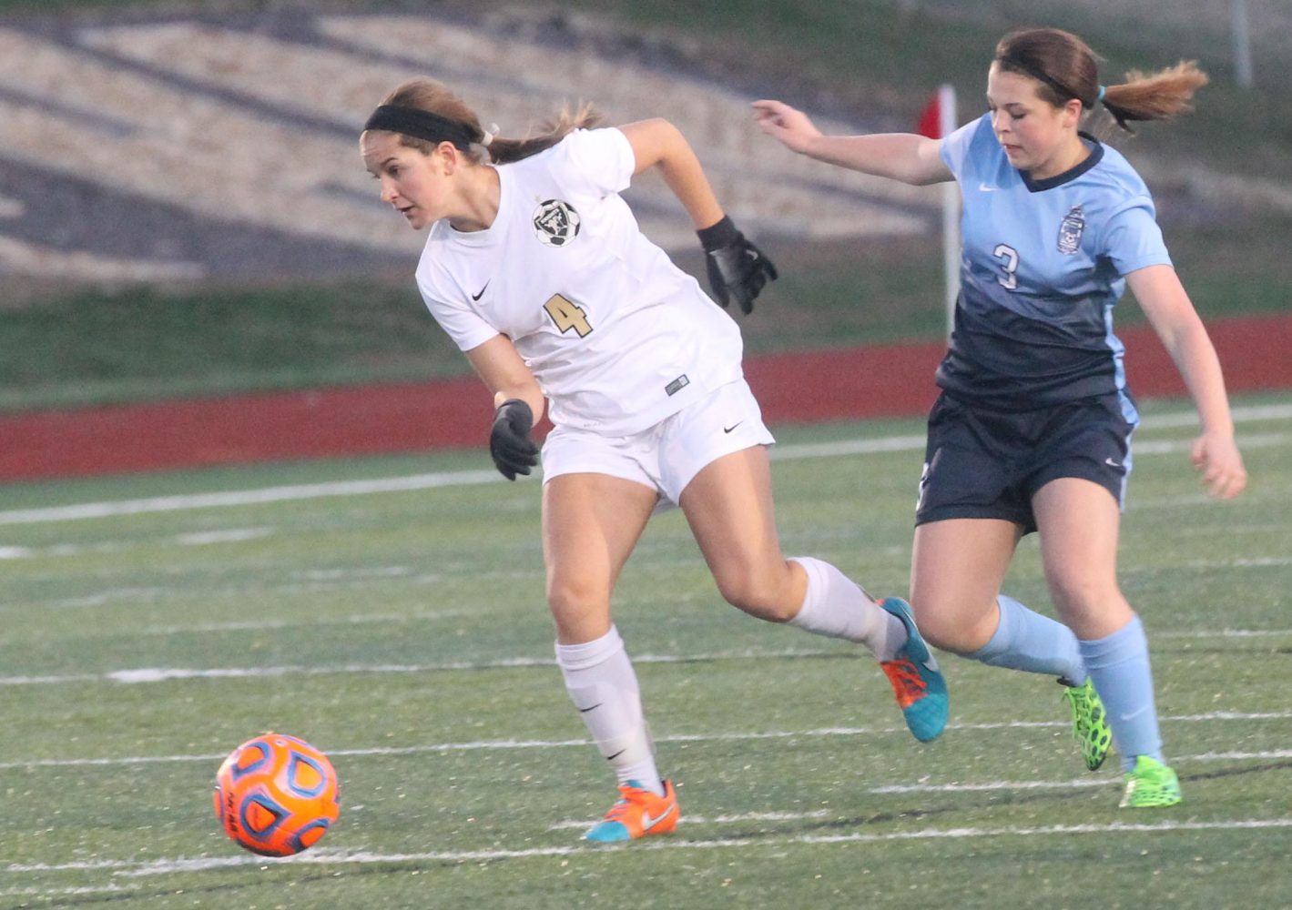 Sophomore Amanda Orlando runs with the ball towards the goal. 