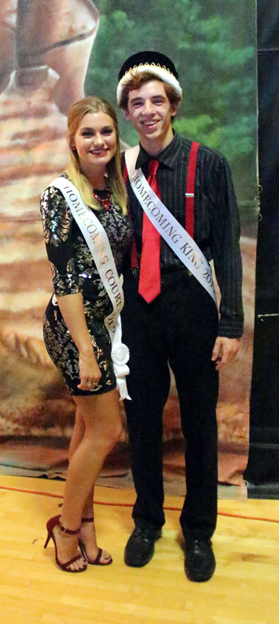 Seniors Matt Borrelli and Abby Day pose after being crowned king and queen of Homecoming court. Once again students of Francis Howell North came together in formal wear to have a great night. The theme of this years homecoming was "Around the World" with lots of flags and food. 