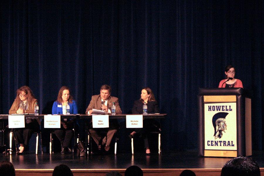 The candidates for school board, Cynthia Bice, Kimberlyann Granger, Mike Hoehn and Michelle Walker sit on stage at Francis Howell Central for meet the candidates night. This night gave parents the opportunity to see how the candidates would act on the school board before the election. The election was on April 5. 