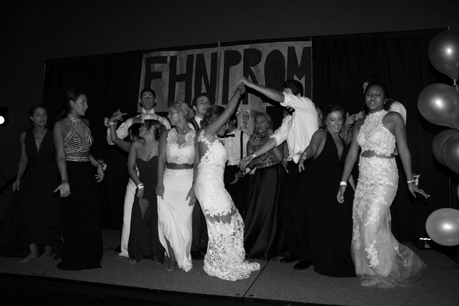 Senior Anna Chowning dances with her date Mitch Carlson at prom. Prom was held at Saint Charles Convention Center with fairytale themed decor.