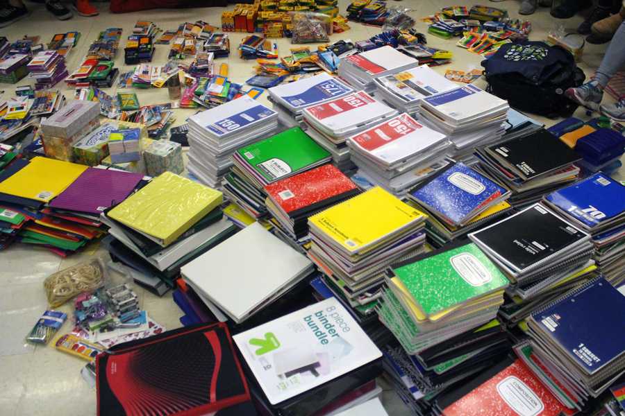 2,230 school supplies items sit on the floor in the publications room after staffers sorted them out. The school supplies were collected through a drive in all first hours. All the proceeds will benefit the Nahed Chapman New American Academy near downtown St. Louis.