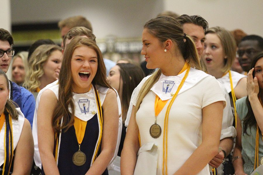 Seniors Emma Chilcoat and Sasha Kaganov have fun receiving their awards.