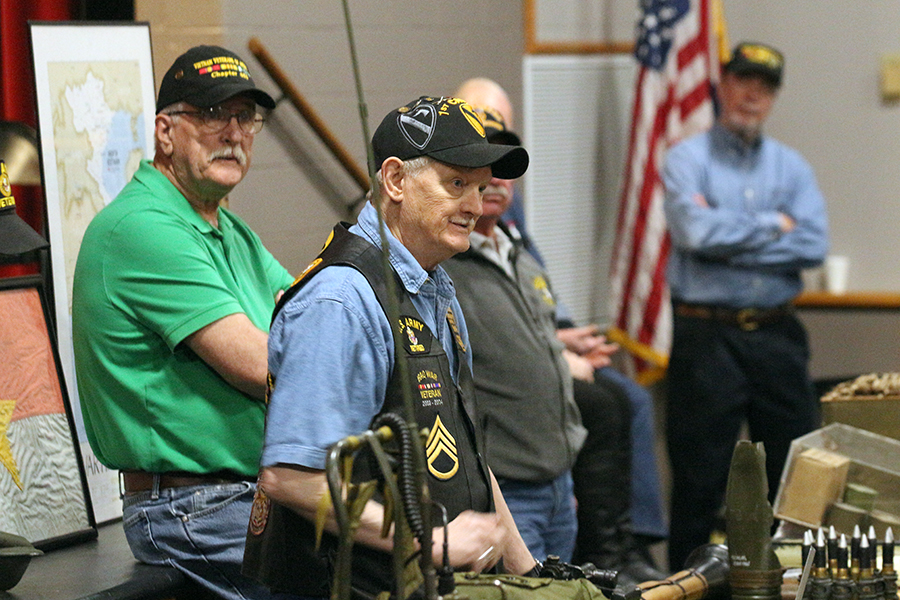 U.S. Army veteran Ron Morrow answers questions from students about his experiences in Vietnam, along with some of the equipment set in front of him. The veteran is part of the Vietnam Veterans of America Chapter 458 based out of St. Peters. The goal of the organization is to educate younger generations as to why serving the country is an important step in protecting the society citizens enjoy in the present day.