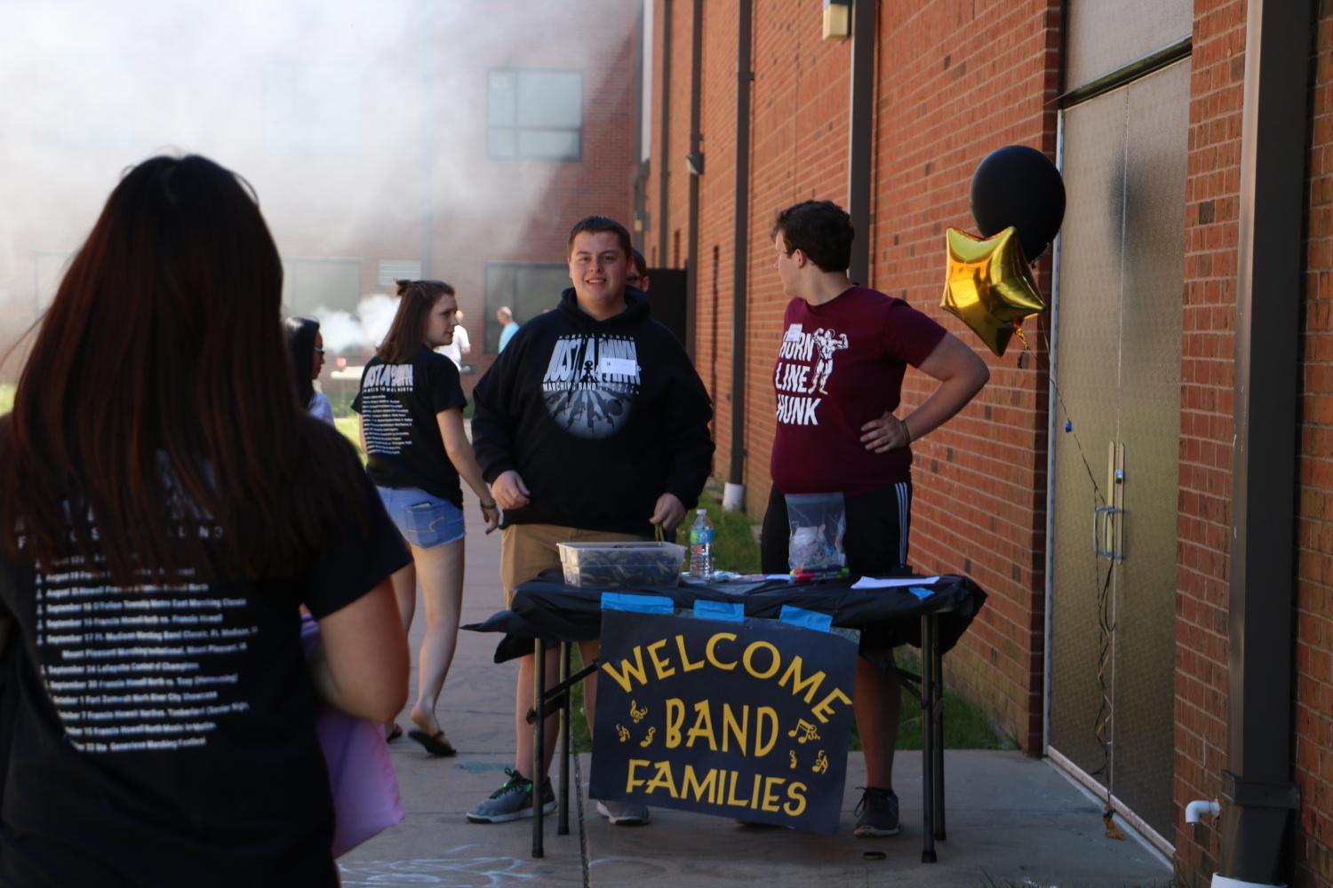 Juniors AJ Bradbury and Christian Witte greet new and old members of the Knightpride marching band. The icebreaker for new students was on April 23 from 1-3pm. With the amount of new students that attended icebreaker, the estimated number of members for the 2017 is over the 100.