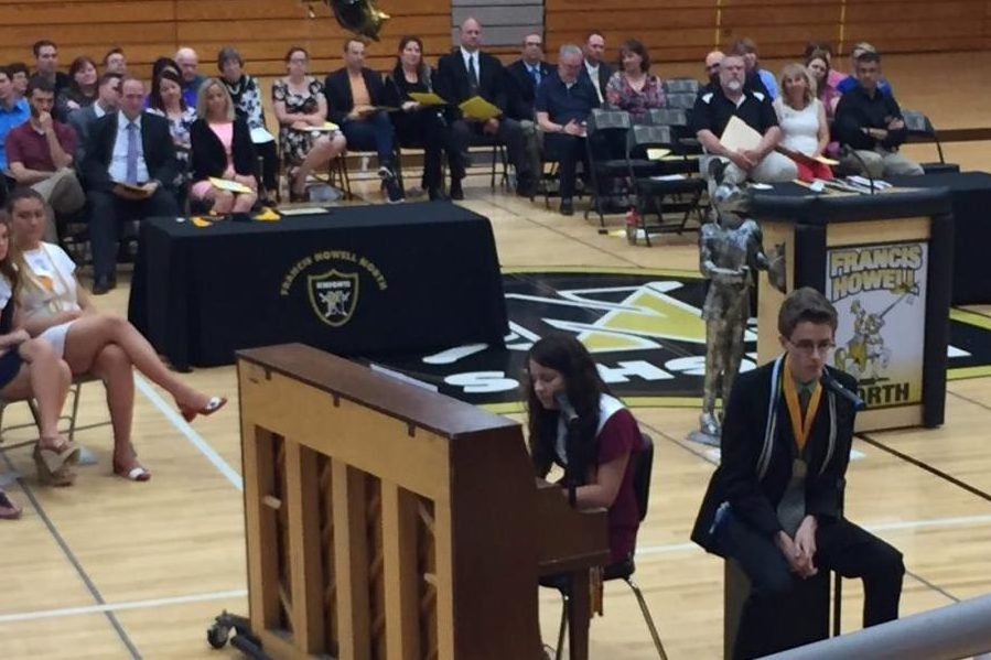 Seniors Dan Borrelli and Emily Henry perform the song Rivers and Roads.