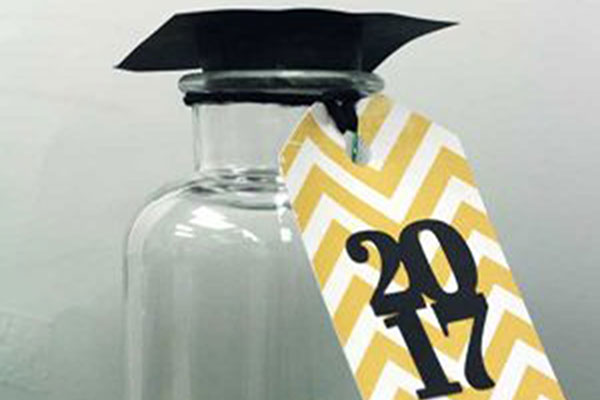 The finished graduation jar sits on a table. 