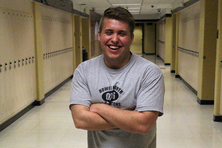 Senior Chase Meyer poses in the Butterfly Hallway for his senior portrait. Meyer was named to Missouri's All State Journalism Team for his work on the FHN student media department over the last three years.