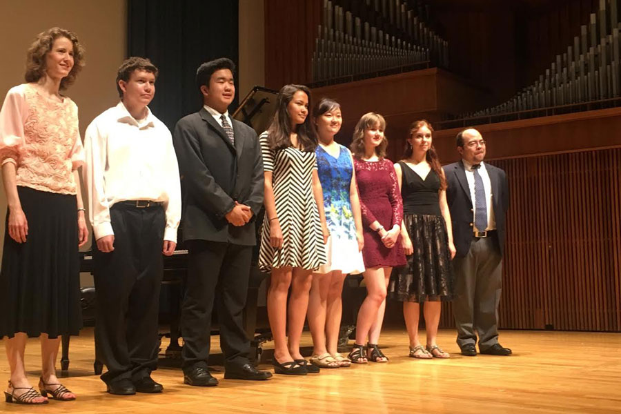 Junior Colin Levins stands on stage with his fellow students after a recital held at Penn State over the summer. Levins attended a camp there last July for seven days. (photo submitted)