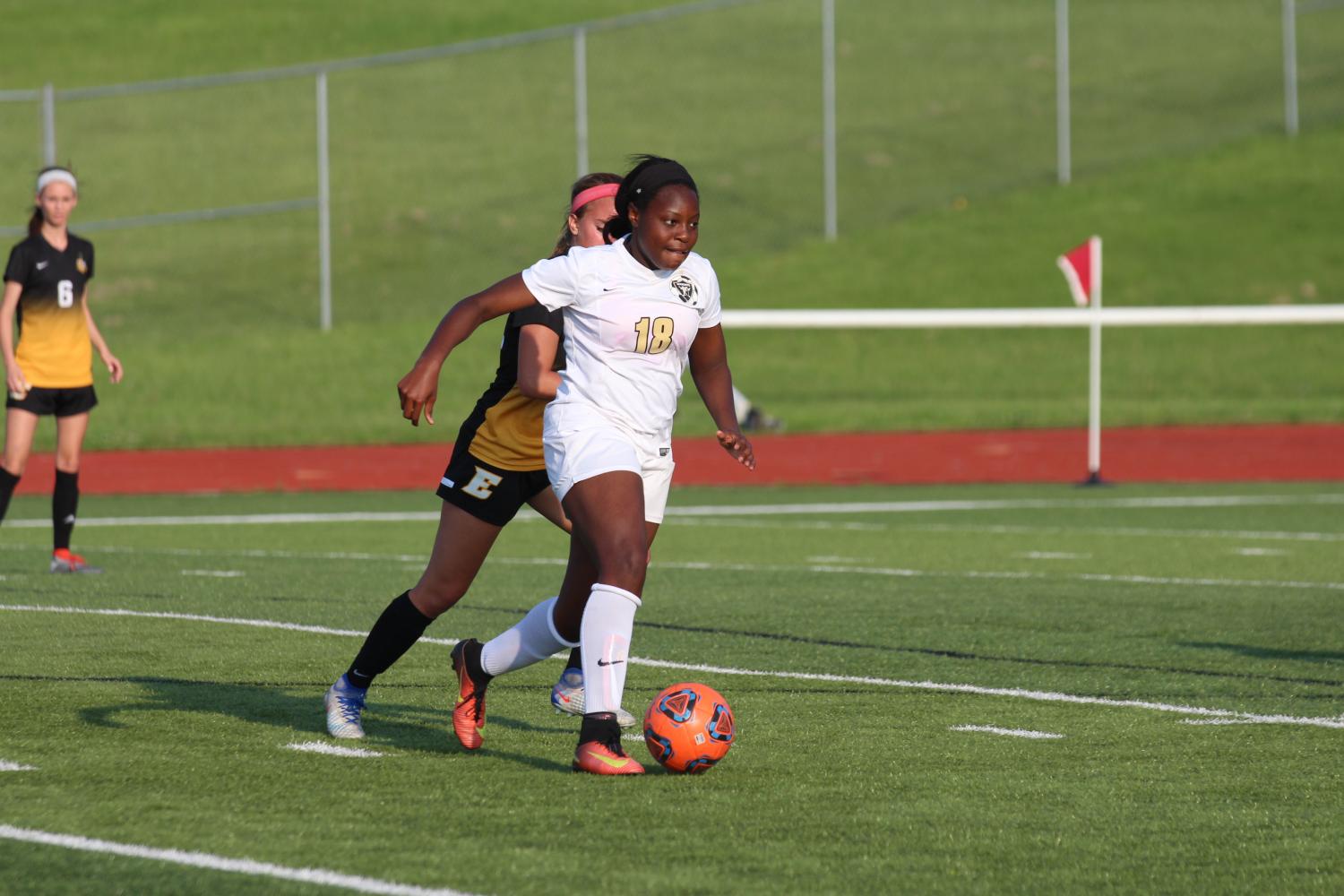 Sophomore Bria Hamilton brings the ball down the field in the Lady Knights' Senior Night match against FZE (Kyra Peper)