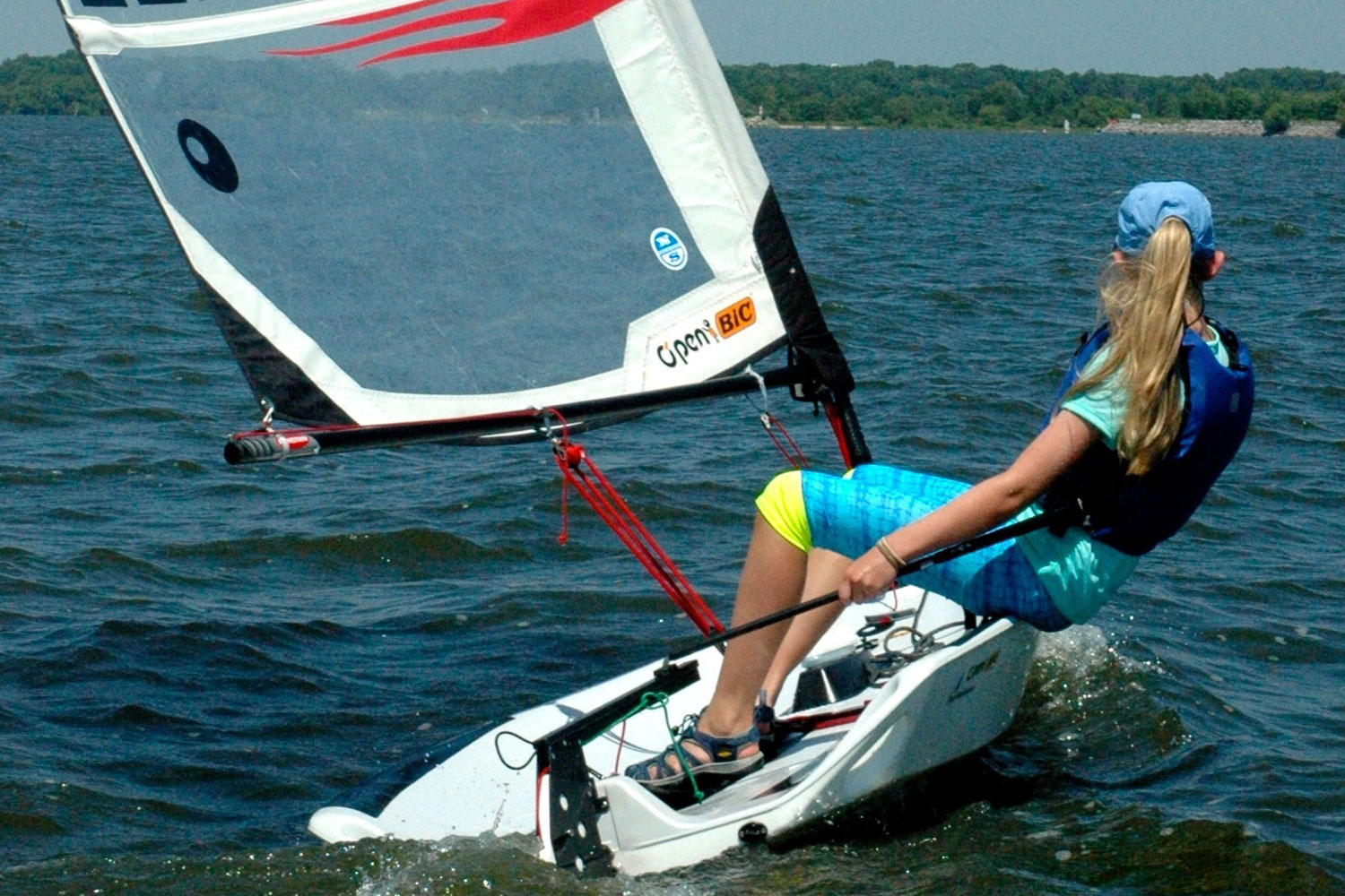 Brenna Hood sails on her boat over Labor Day weekend at Lake Carlyle in Southern Illinois. Hood's parents, Mark and Emily Hood, taught her to sail. (photo submitted)