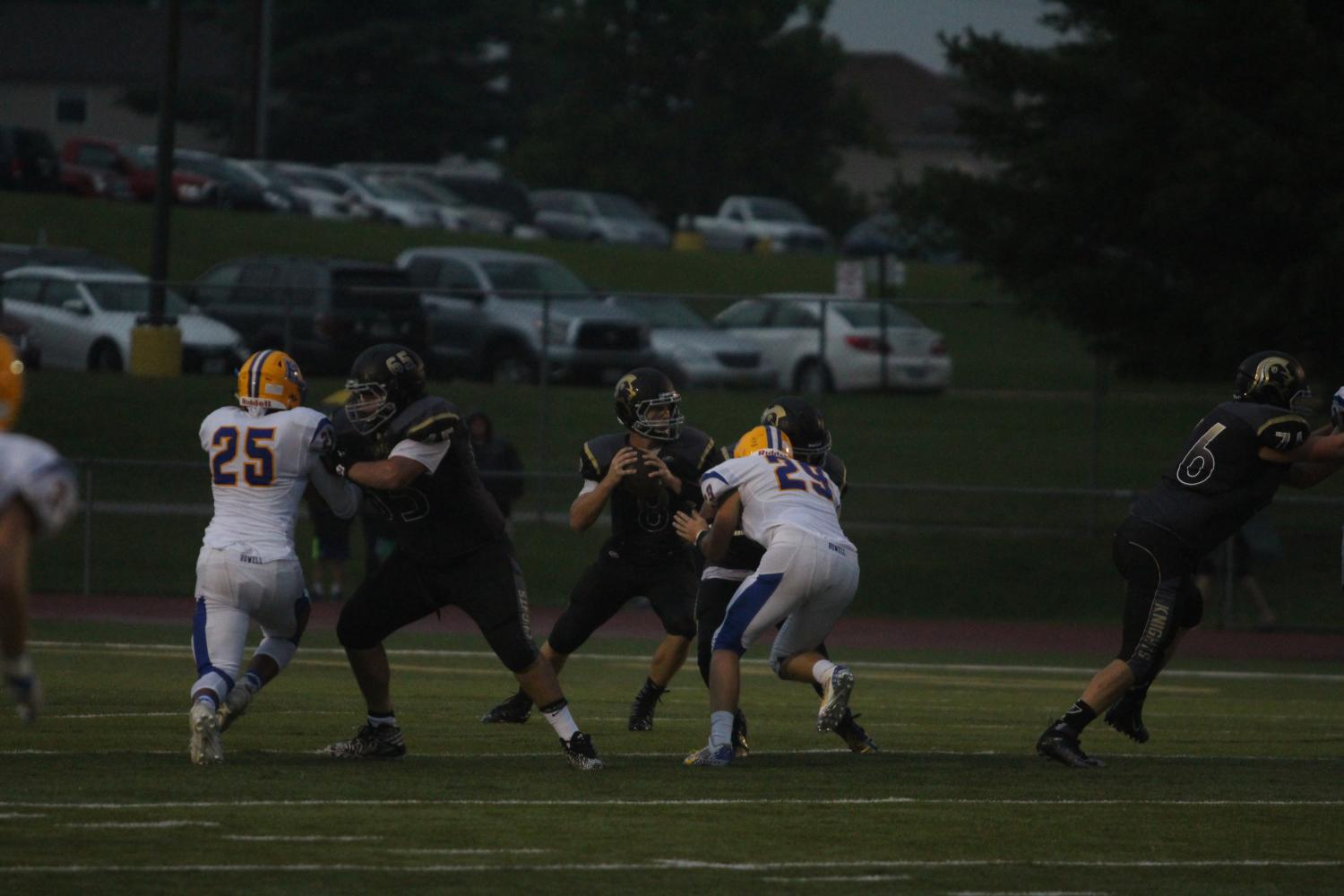 Connor Gallagher is getting set to throw the football against Francis Howell High School.