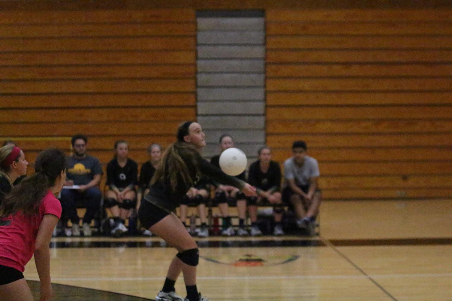 Junior Hannah Zimmerman bumps the ball (Photo by Wil Skaggs)