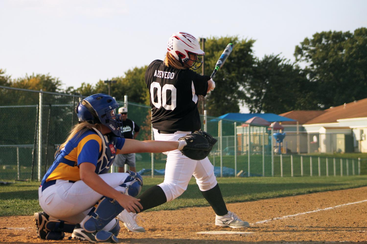 On Sept. 5, senior Brianna Azevedo scores the first run of the varsity softball game against FHHS. At the end of the game, seven more runs were hit by her teammates after her. They lost with a score of 8-13.