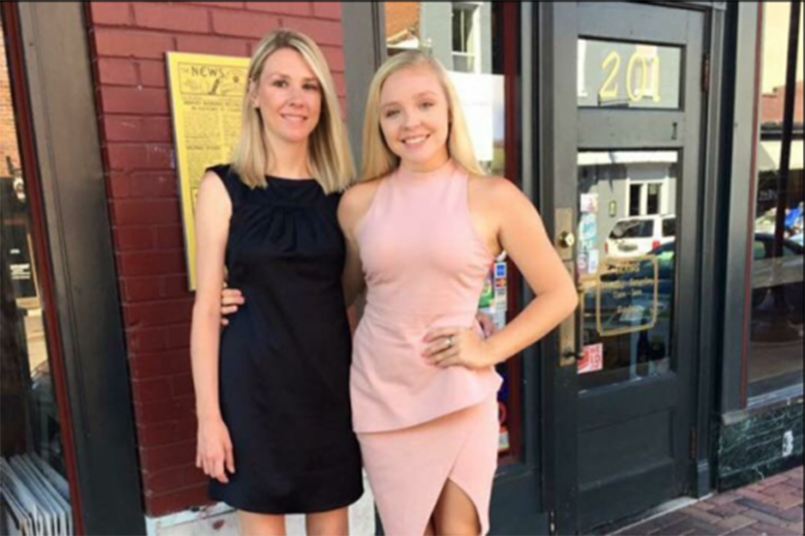 Sophomore Plum Rousseau stands with her mother, Yolanda Rousseau, for a family friend's wedding.