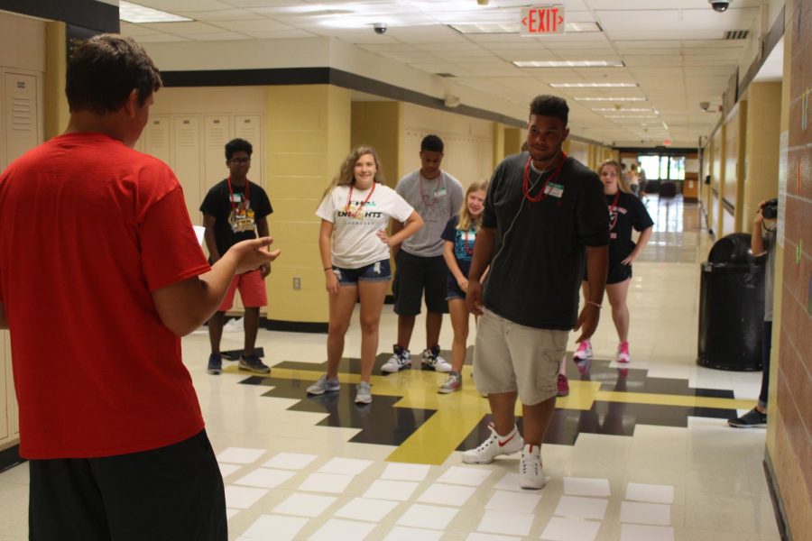 FHN Mentor guides new freshmen through the hallways, giving them a tour of the school.