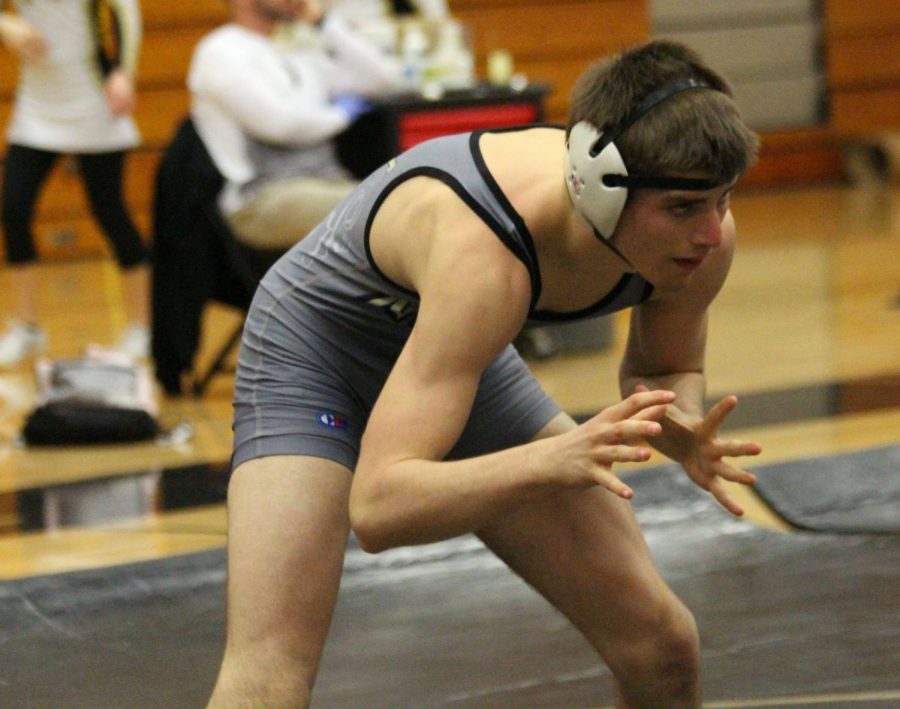 Junior Dillion Later gets set to wrestle his opponent in a match in Francis Howell North's gym. 