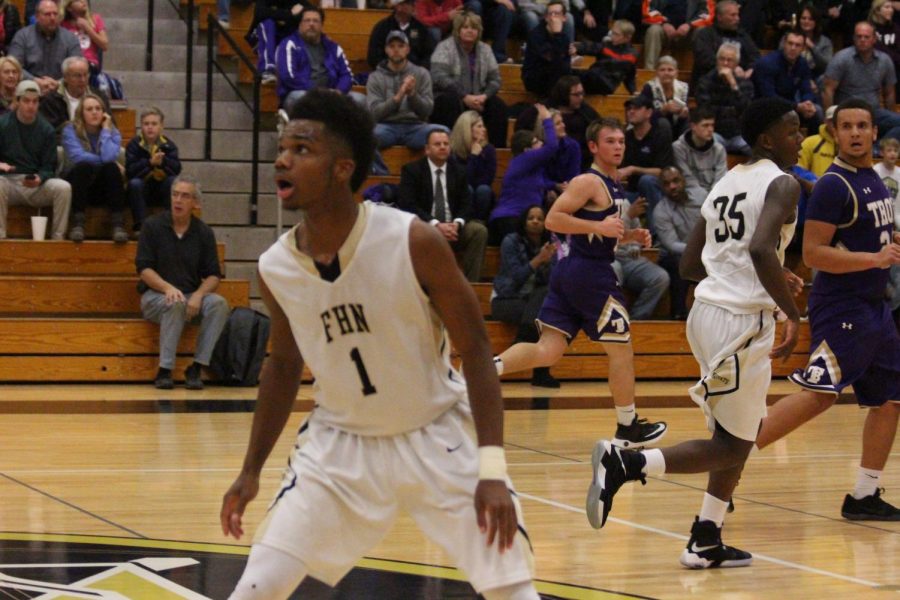 Justin Mathews-Williams resets on defense for Francis Howell North as they take on Troy Buchanan on 1/10. 