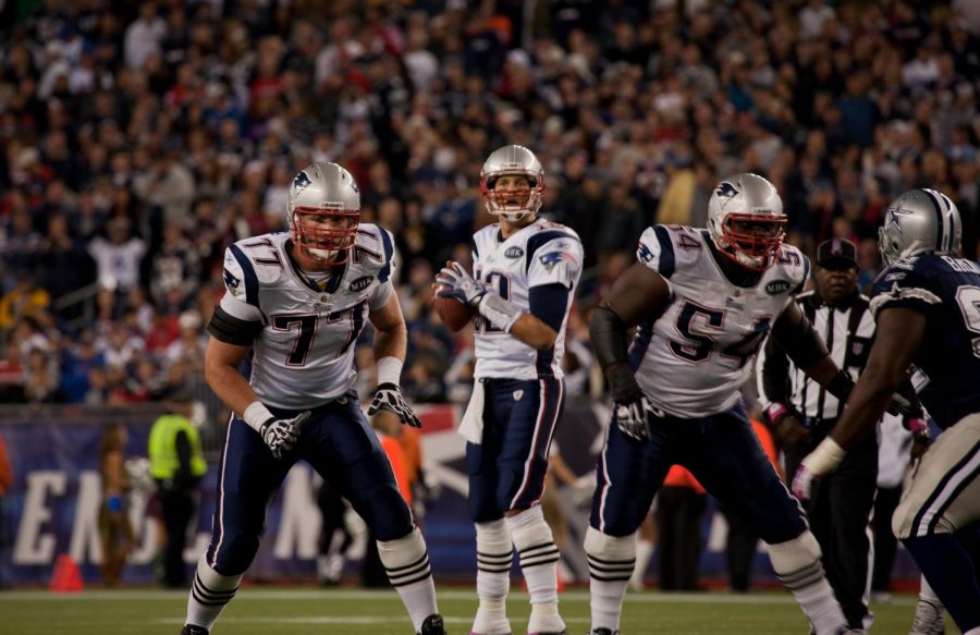 BOSTON - OCTOBER 16: Quarterback Tom Brady, No 12, prepares to throw pass at Gillette Stadium, New England Patriots vs. Dallas Cowboys on October 16, 2011 in Foxborough, Boston, MA