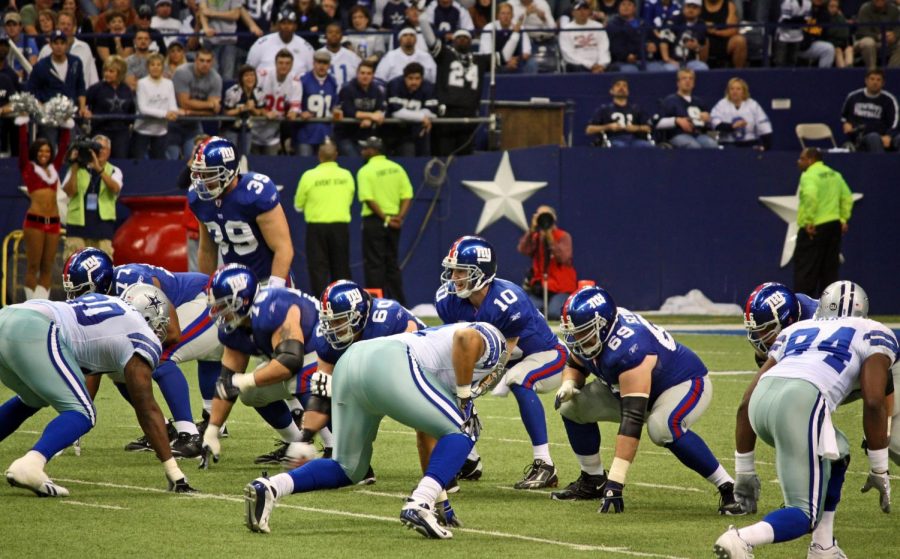 DALLAS - DEC 14: Taken in Texas Stadium on Sunday, December 14, 2008. Quarterback Eli Manning calls signals for the NY Giants offense against the Dallas Cowboys defense.