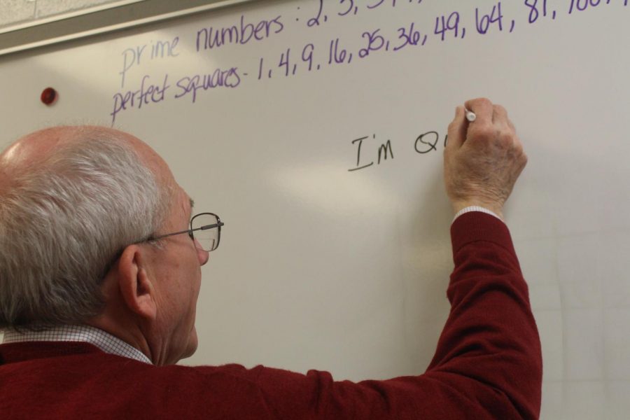 Edwards writes an inspirational quote on the dry erase board. When class started, he has the whole class repeat it after him. 