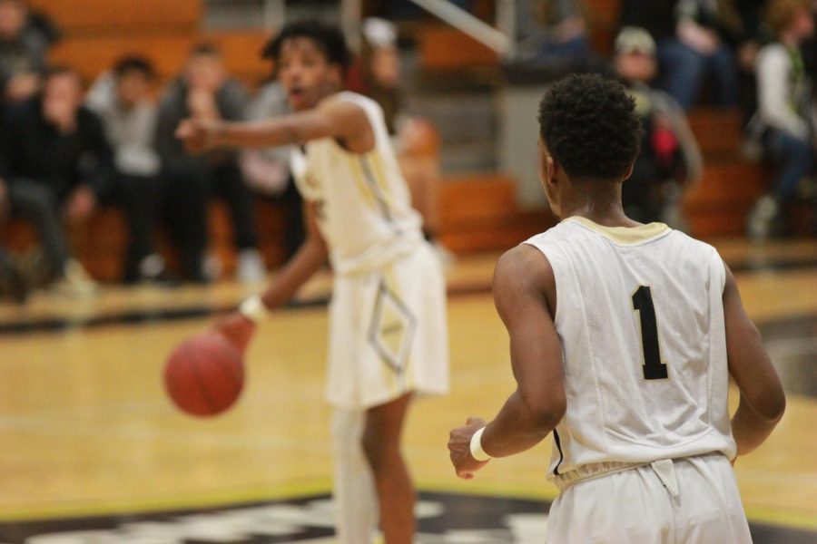 Senior Justin Mathews-Williams playing on offense against Francis Howell High