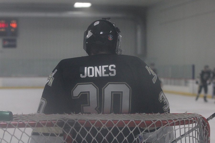 Sophomore Charlie Jones guards the goal in a game against Holt.