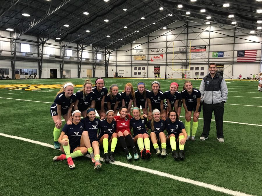 Junior Abbie Miller poses for a picture after a game with her soccer team. Miller has been playing Scott Gallagher Elite for four years. Miller is seated on the bottom row on the far left. (Photo submitted)