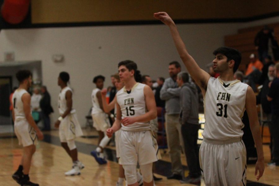 Senior Rizwan Hyder warms up shot against Timberland.