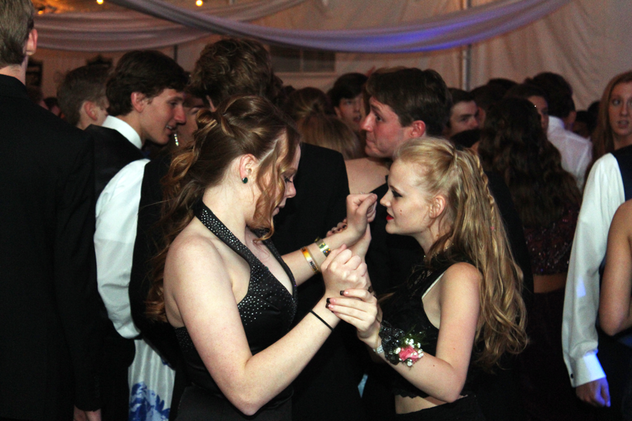 Haley Geer and Autumn Davis dance at last year’s Prom on May 6 in New Town. The theme for the dance was a Knight in Hollywood. (file photo)