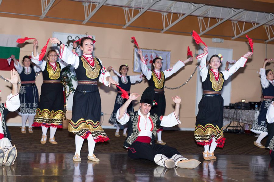 Junior Michaela Mihova performs with her Bulgarian dance team. Mihova has been doing
Bulgarian dance for almost four years and was encouraged by her family to join. The group
practices on Sundays at a variety of local dance studios. “My favorite part is having that small
but significant part of Bulgaria with me, being here in America,” Mihova said. (Photo submitted)