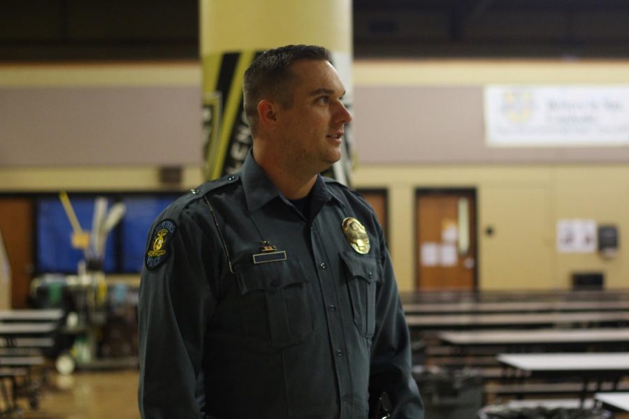 School Resource Officer Travis Scherder stands watch in the school lunchroom during passing period. One of Scherder’s many jobs is to escort students throughout the halls during school hours. Scherder believes the new school policy is going to be very beneficial for the safety of the school and decrease the number of fights that have occurred this year.