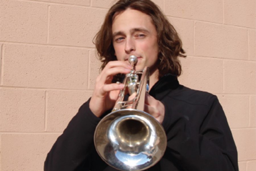 Senior Ian Perry plays his trumpet. Perry was accepted into a drum
corps in January. “My first thought when I saw I was accepted was
just wow,” Perry said.