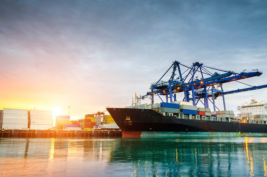 Containers loading by crane in the morning, Trade Port, Shipping.