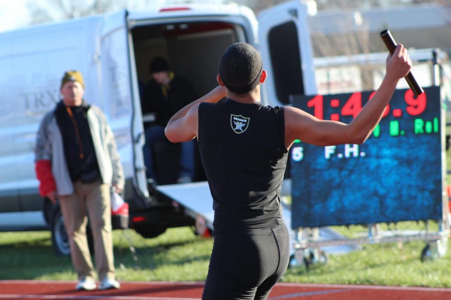 Sprinter finishes race at the Saint Charles West meet.