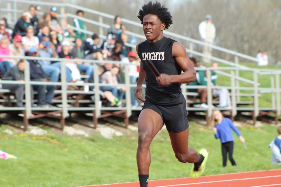 Junior Sterling Jones competes in a relay race on 4/20 at FZN.