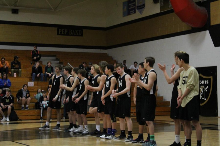 The varsity volleyball team lines up ahead of their March 27 meeting with Fort Zumwalt East.