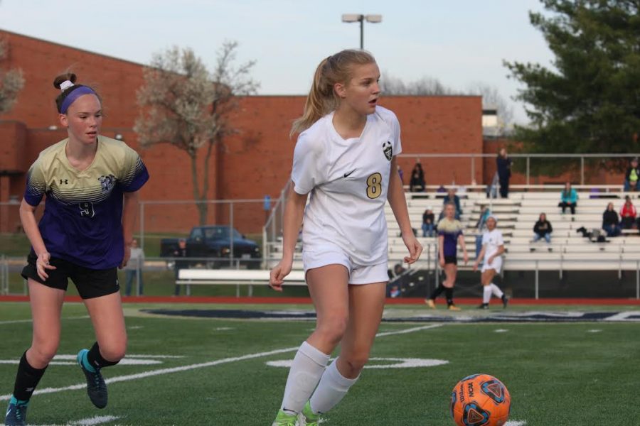 Freshman Julia Kristensen takes possession of the ball vs. Troy Buchanan on 4/17. 