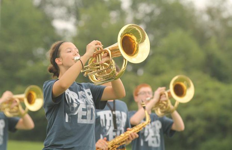 Band students rehearse their set from "Trapped," a theme from previous band seasons. (file photo)