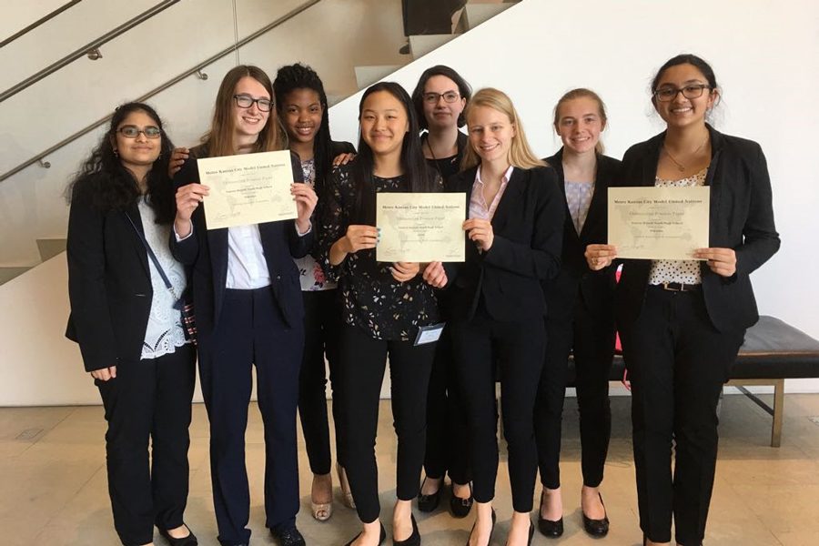 Model UN members pose together with their awards. The team traveled to Johnson County Community College in Overland Park, KS. It was the teams first conference together as a group. Each member represented a different country and had to debate about topics common to that country.(Photo Submitted)