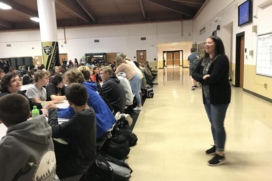 Assistant Principal Erin Steep laughs with students in the FHN commons during one of three lunch periods.